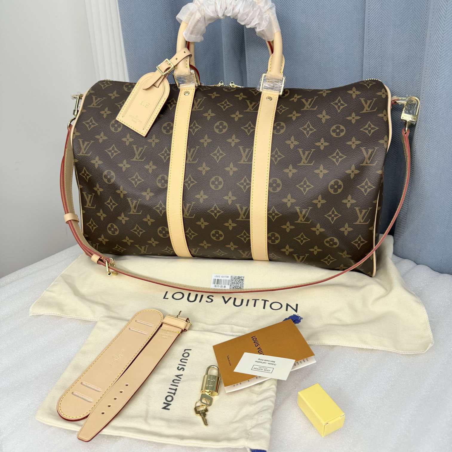 L\V KEEPALL HOTSTAMP 251103